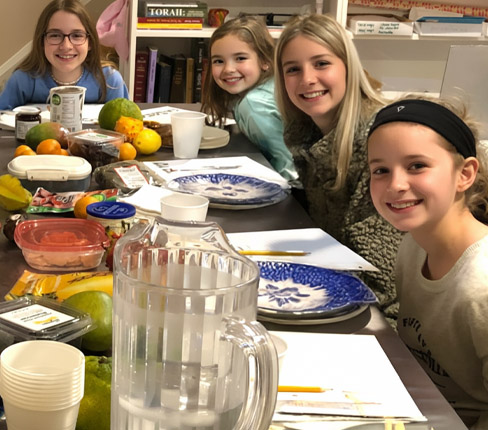 Joanne's Home Hebrew School preparing a meal